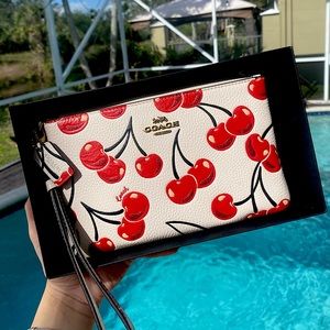 SOLD- NWT Coach Cherry Wristlet Bag